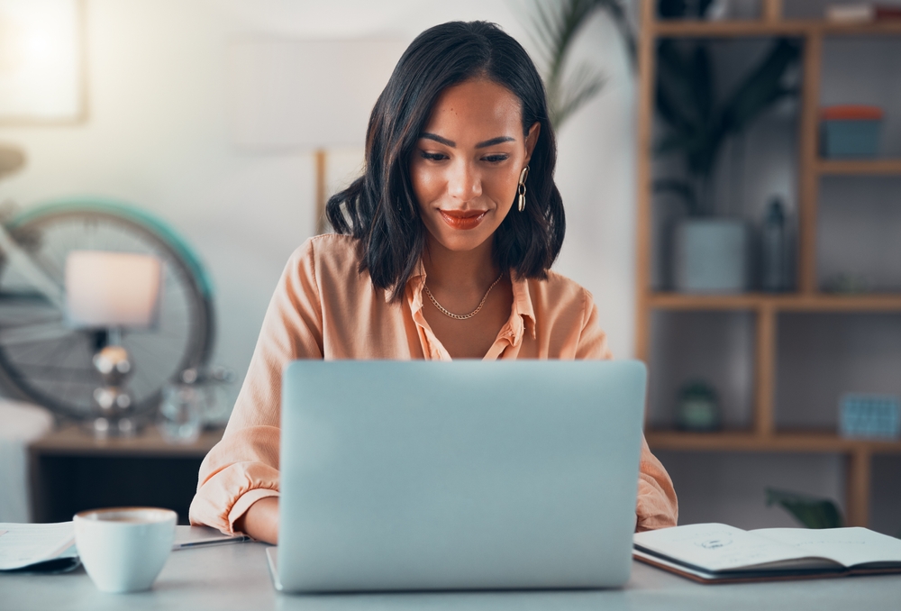 Woman,Working,On,Laptop,Online,,Checking,Emails,And,Planning,On